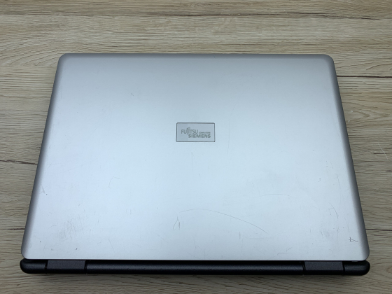 Б/в Ноутбук Fujitsu Amilo Pi1556 Intel Core 2 Duo T7200 / 2 Гб / SSD 120 Гб / Клас В